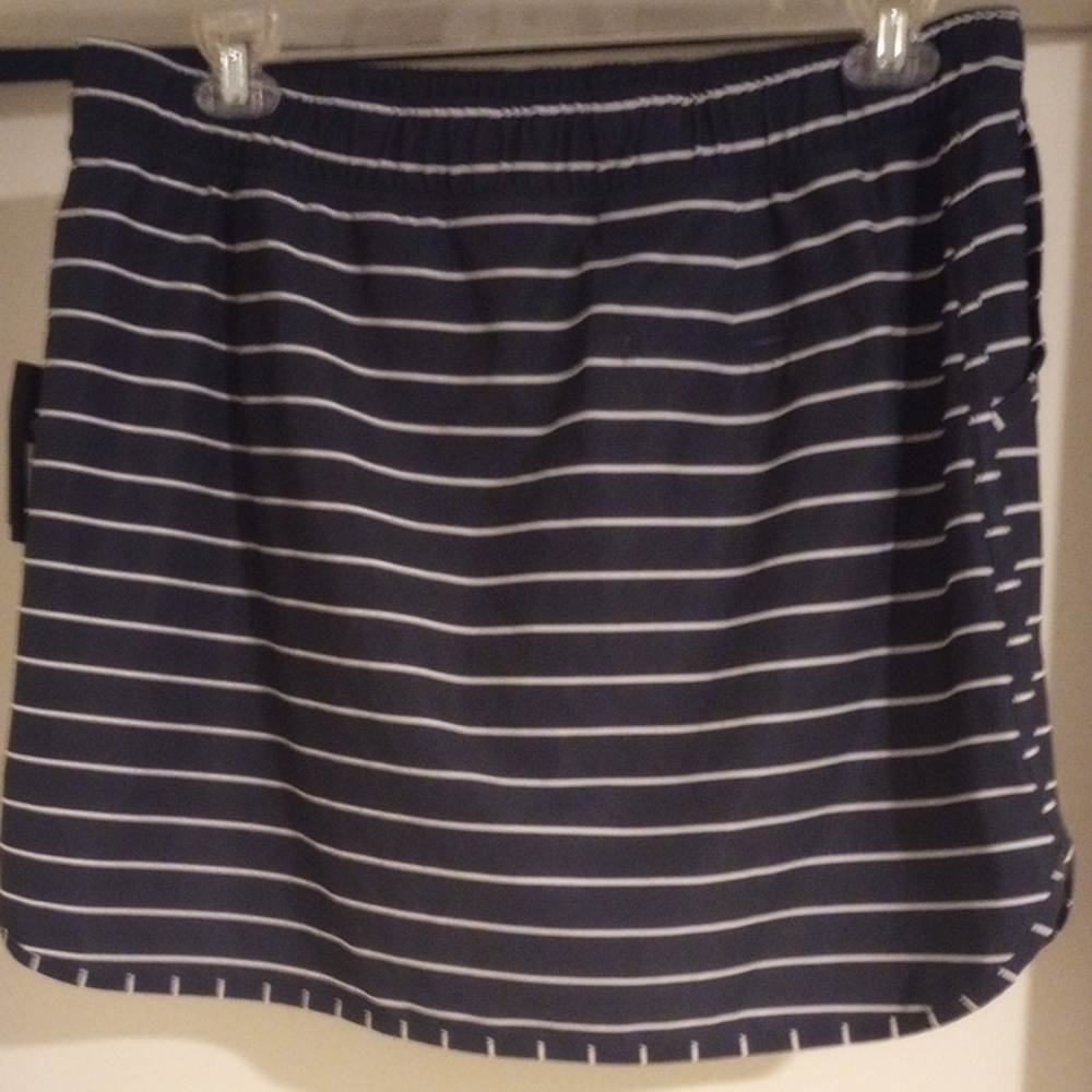 Slazenger Navy and White Striped Golf Skort With Pockets And Drawstring Waist.